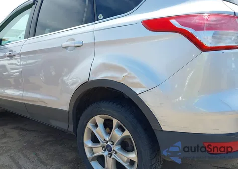 2014 Ford Escape Titanium z USA, uszkodzony, nr VIN 1FMCU9J90EUB13882